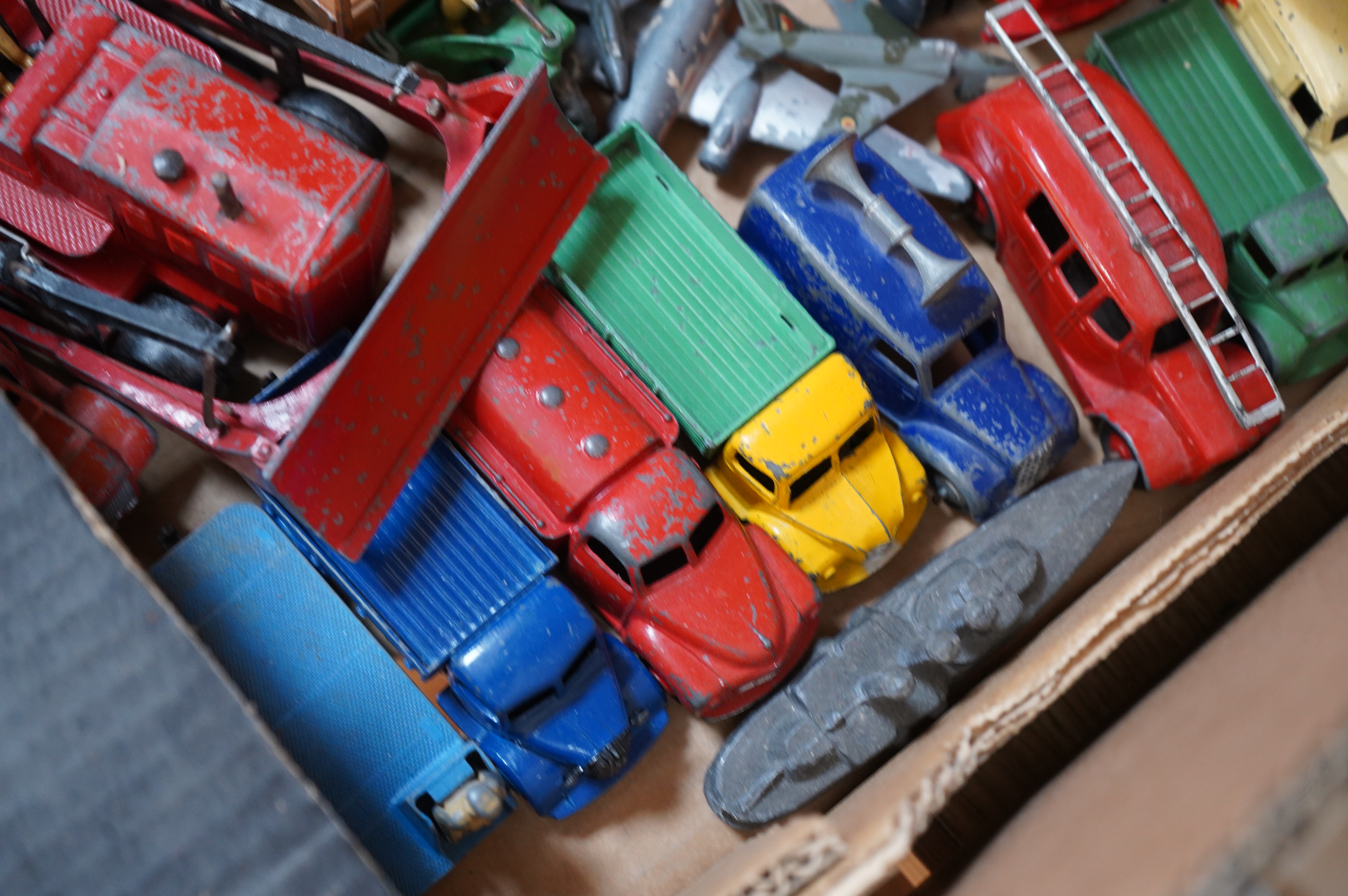 A collection diecast vehicles, lead figures, tinplate, etc. by Dinky Toys, Corgi Toys, Matchbox Series, etc. including; twenty 1950s/60s Dinky Toys, twelve Corgi Toys, two Matchbox Series Collectors Cases (41), both with